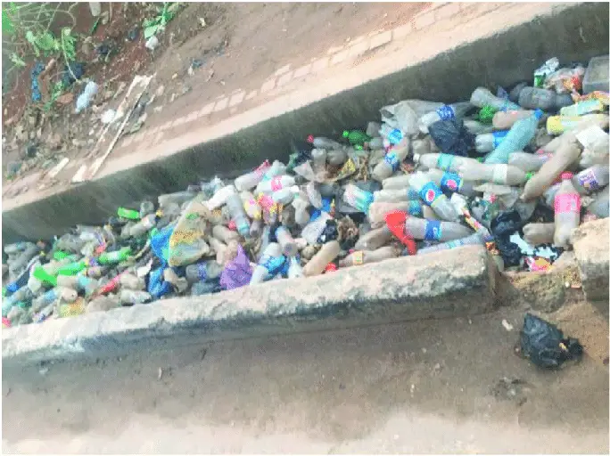This picture is an example of how plastic can increase plastic in the environment by blocking drainages.