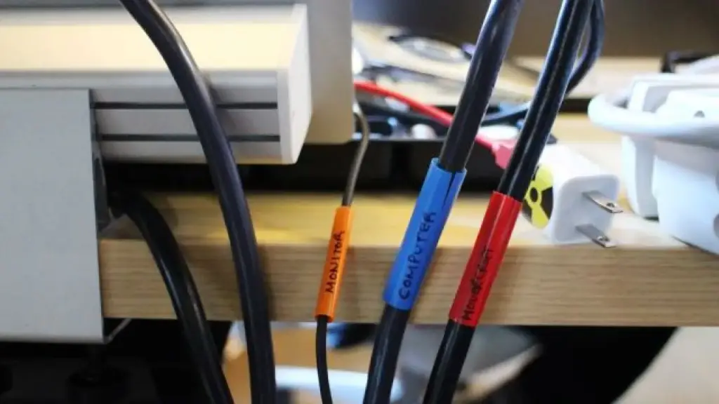 This picture shows how plastic straw is used to label cords to avoid confusion.